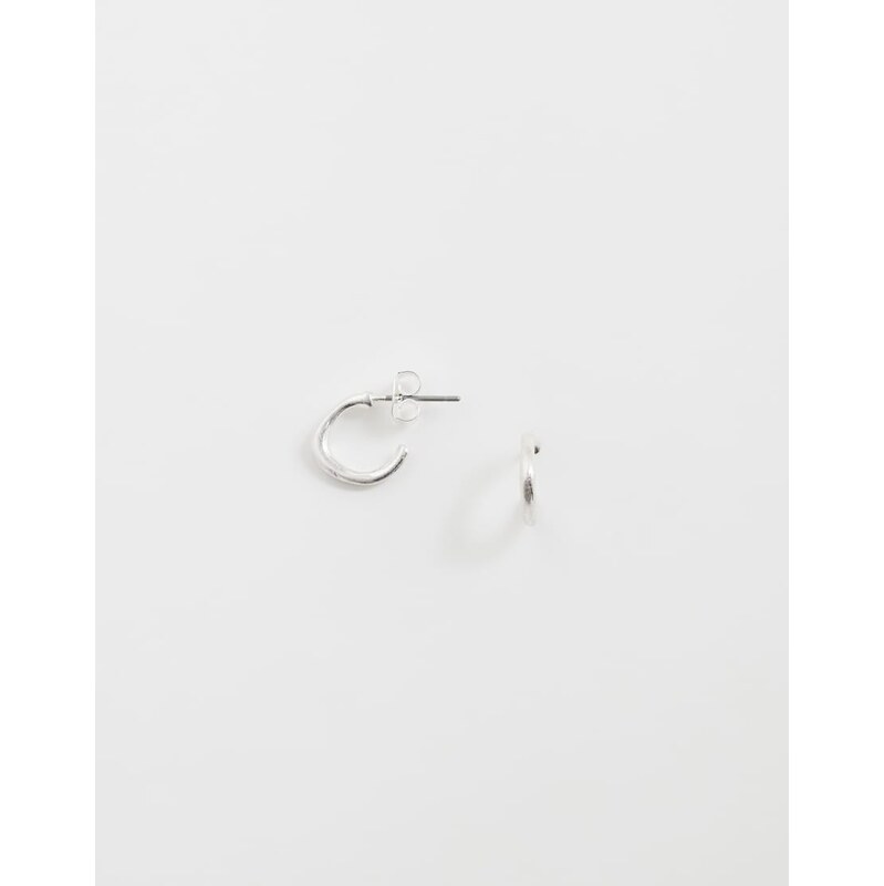 ASOS DESIGN molten hoop earrings in worn silver