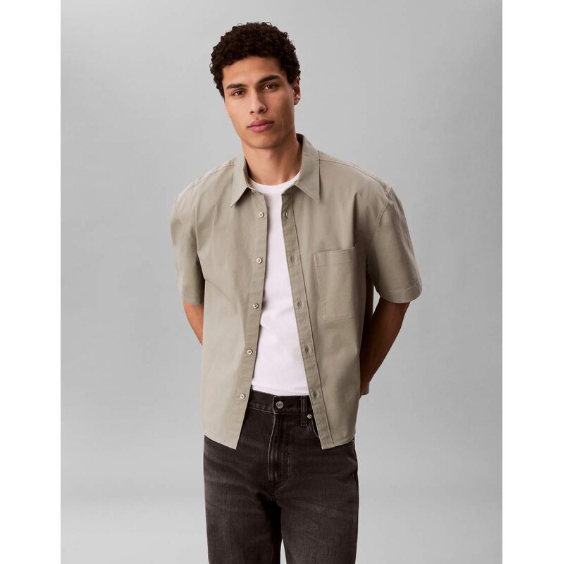 Calvin Klein Jeans boxy relaxed fit short sleeve shirt in khaki-Green