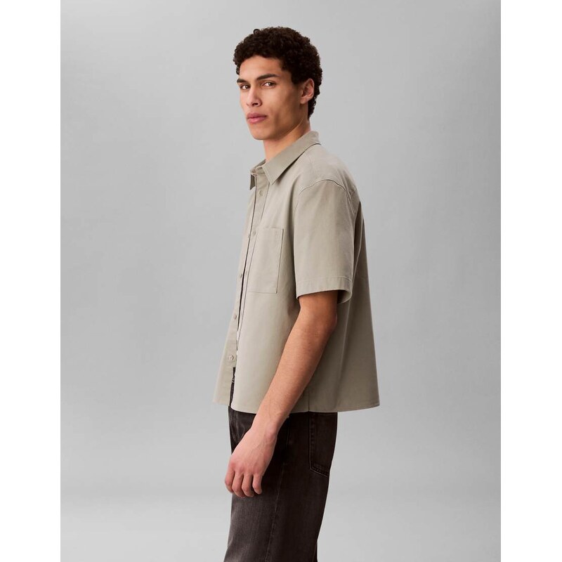 Calvin Klein Jeans boxy relaxed fit short sleeve shirt in khaki-Green