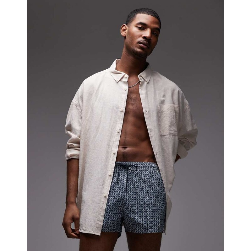 Tommy Hilfiger drawstring swim short in blue geo print