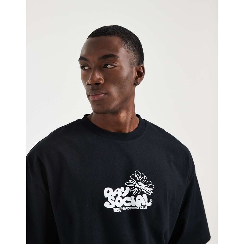 ASOS DESIGN oversize t-shirt with floral graphic in white-Black
