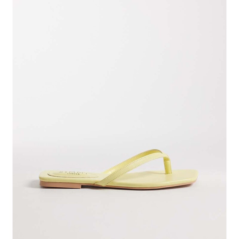 Simmi Wide Fit Simmi London Wide Fit Danny flip flops in yellow 115678919