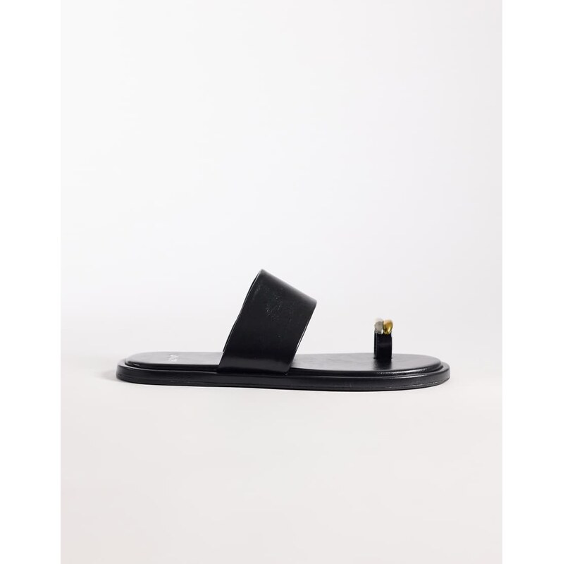 Schuh Tyme toe loop sandal with gold embellishment in black