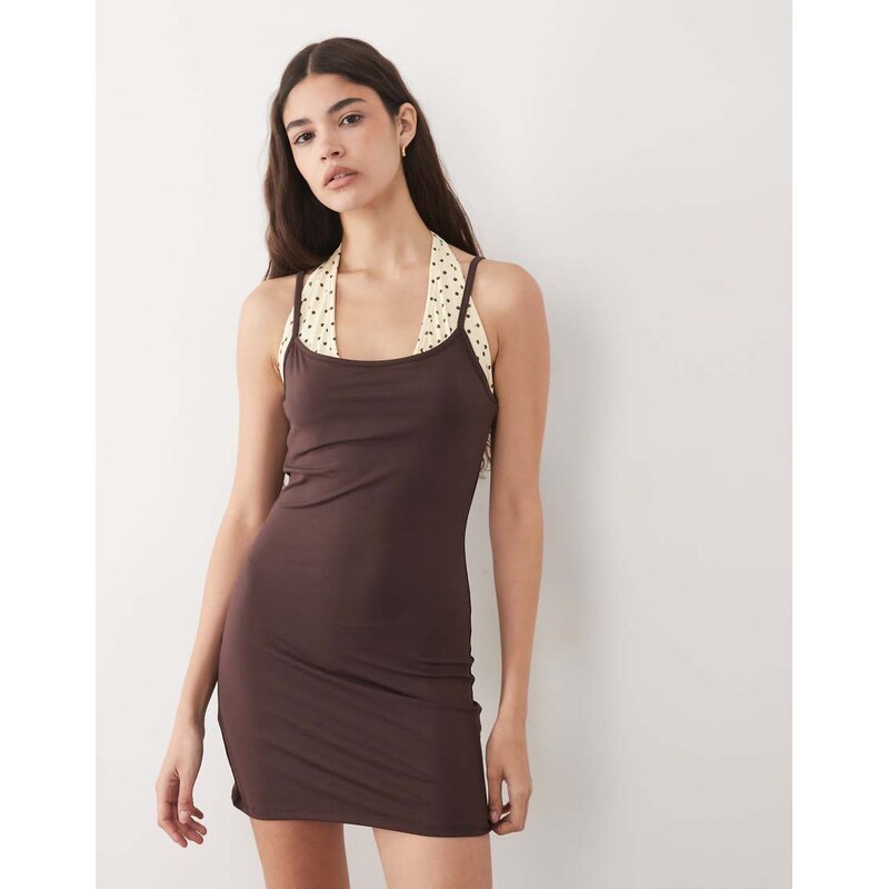 ASOS DESIGN yellow contrast polka dot halter mini dress in brown