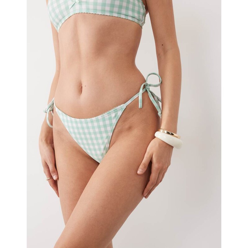 The Frolic exclusive tie side bow front bikini bottoms co-ord in