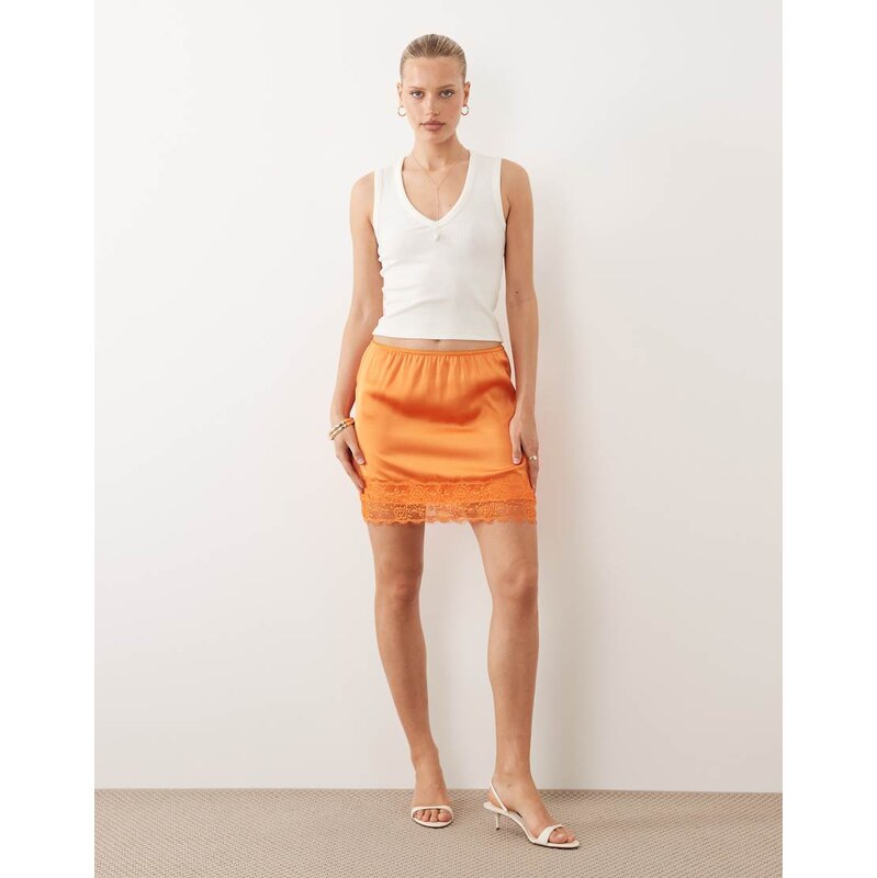 ASOS DESIGN lace trim satin mini skirt in orange