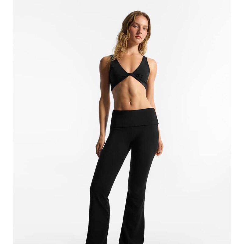 Bershka Petite technical flared trousers with turn-down waist in