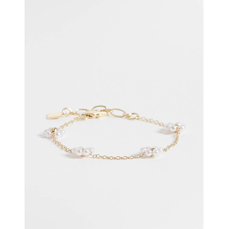 ASOS DESIGN bracelet with faux-pearl flowers in gold tone 115568858
