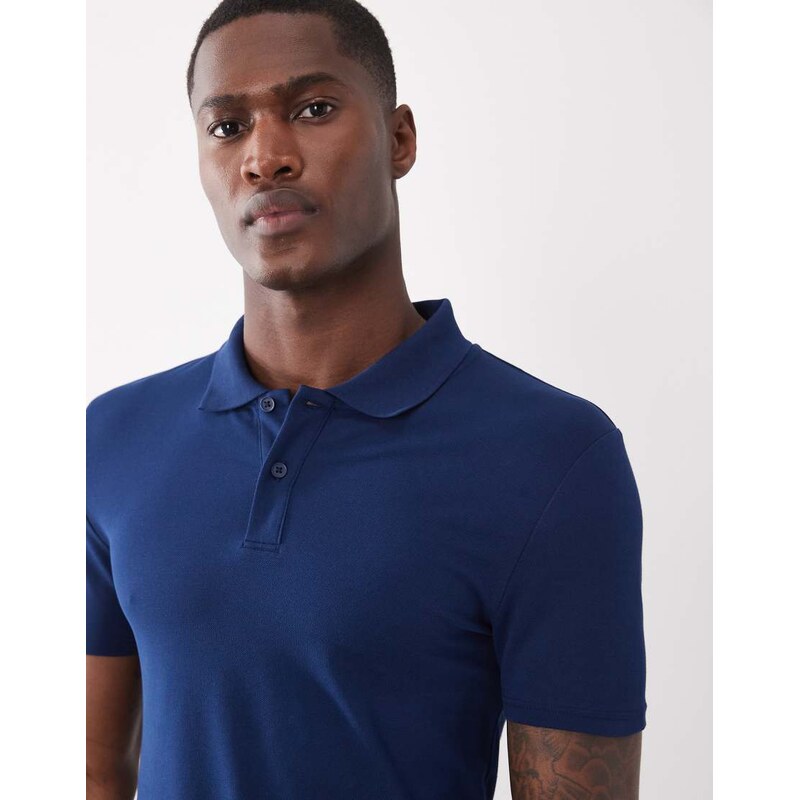 ASOS DESIGN Essentials muscle fit polo in navy pique