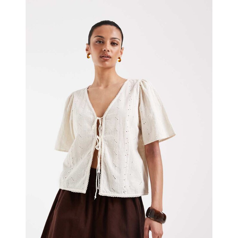 Vero Moda tie front cutwork broderie flutter sleeve blouse in cream 115610159
