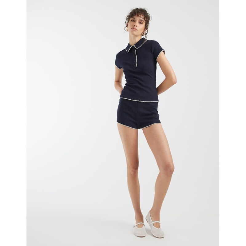 ASOS DESIGN shrunken polo with blanket stitch detail in navy