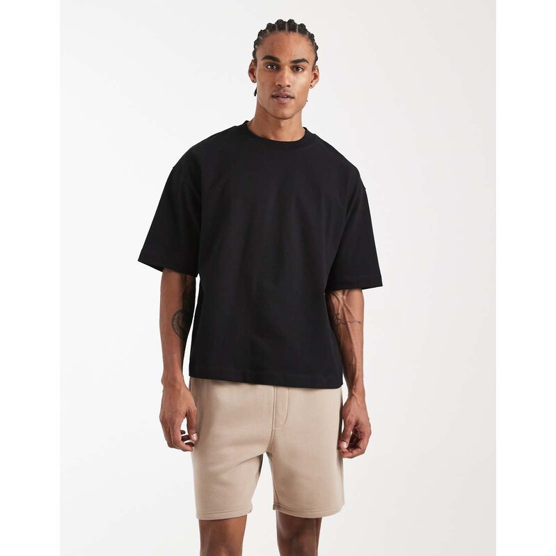 ASOS DESIGN essentials slim mid length jersey shorts in beige