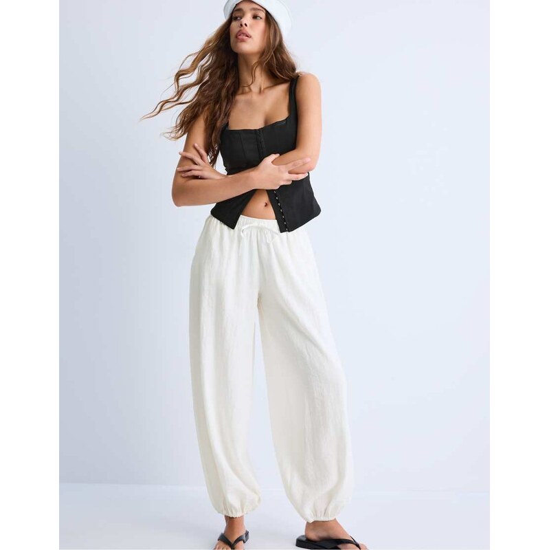 Stradivarius Flowy sarouel trousers in ecru-White 115634518