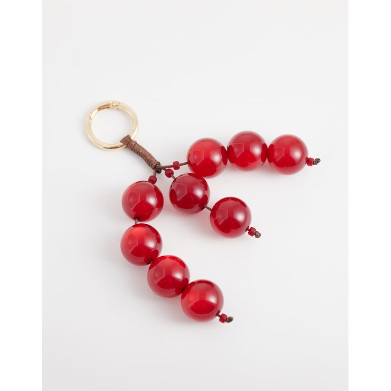 ASOS DESIGN berry bag charm in red 115634346