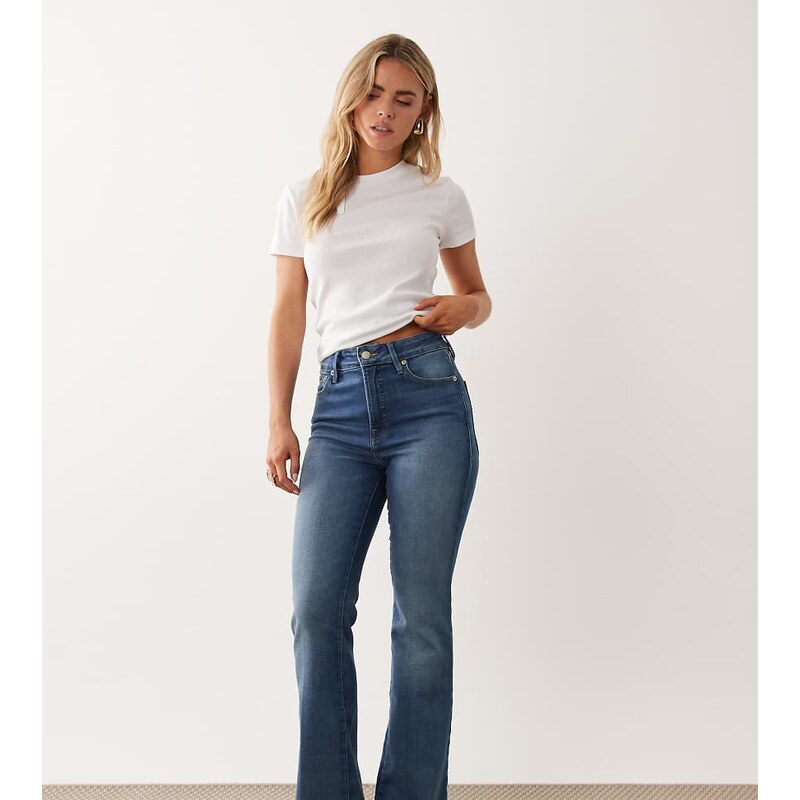 Good American Petite soft tech classic bootcut jeans in mid blue wash 115642344