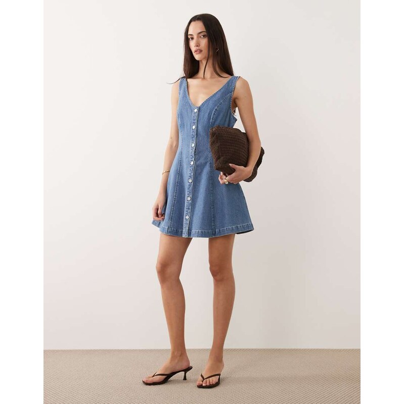Good American denim v-neck sleeveless mini dress in mid blue wash 115642356