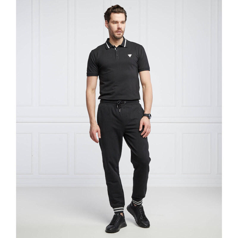 GUESS Tepláky Adam | Relaxed fit