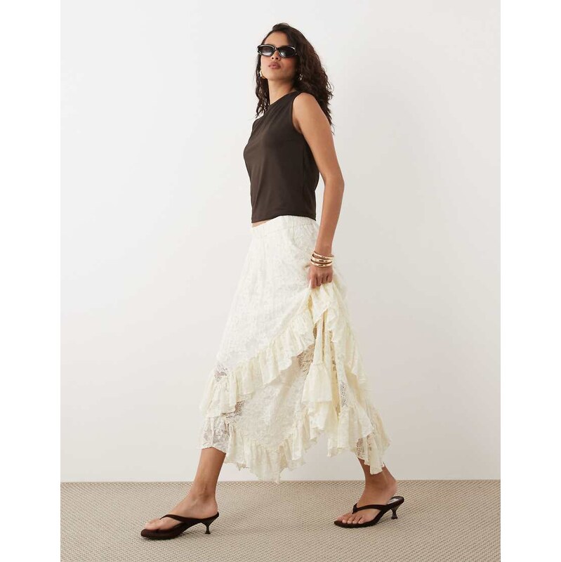 YAS all over lace ruffle trim hanky hem skirt in cream-White 115681988