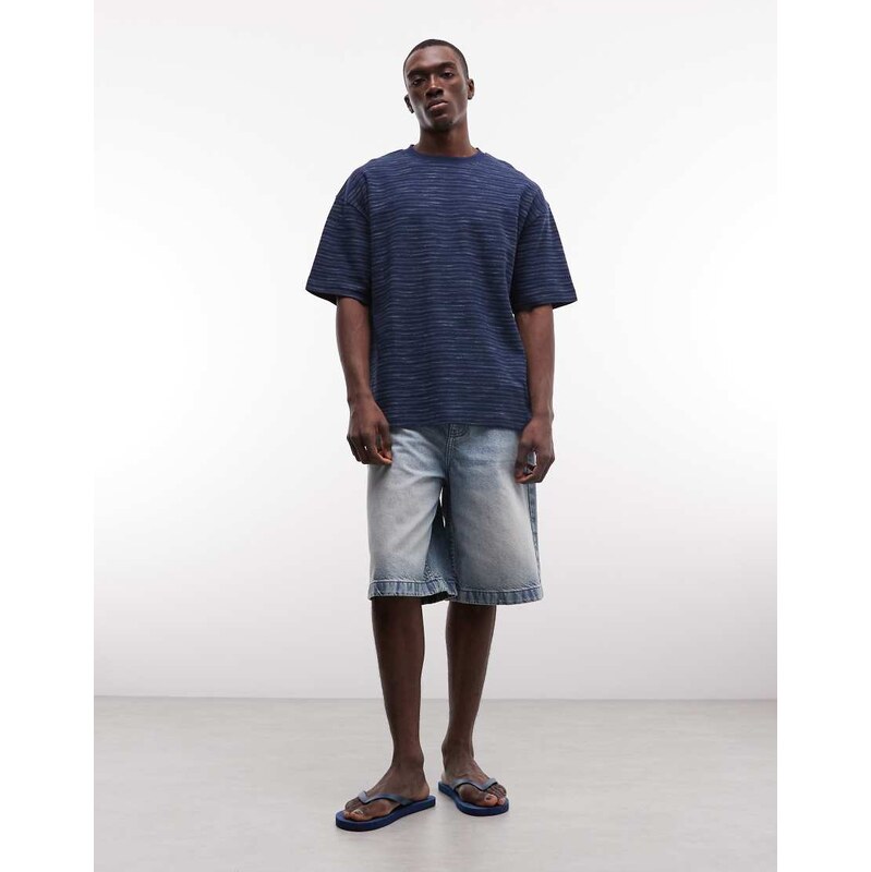 ASOS DESIGN loose denim jorts in light wash blue with tint