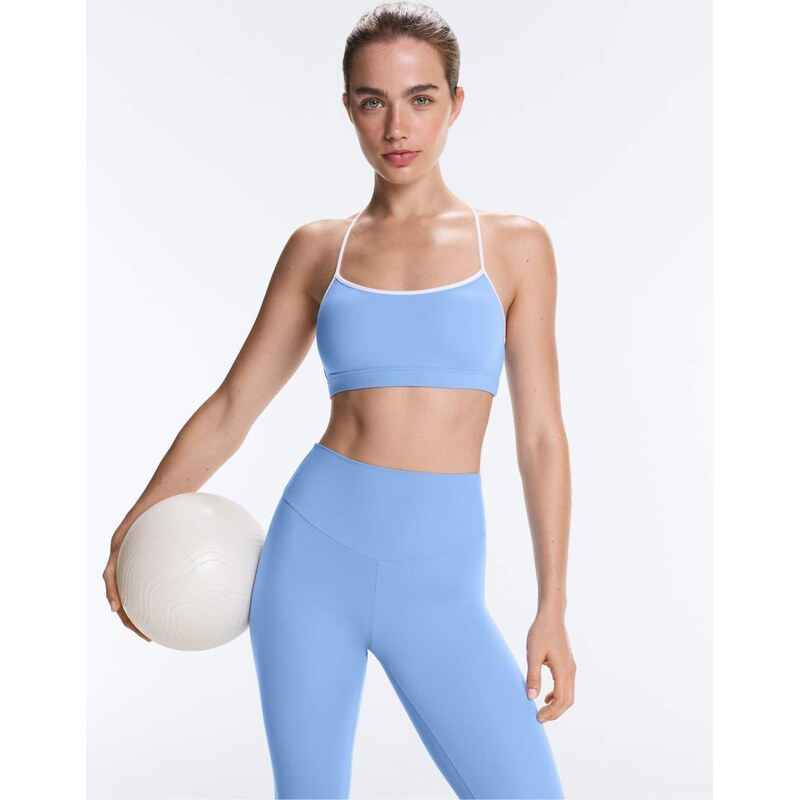 OYSHO Light-support comfortlux sports bra with piping in blue 115704891
