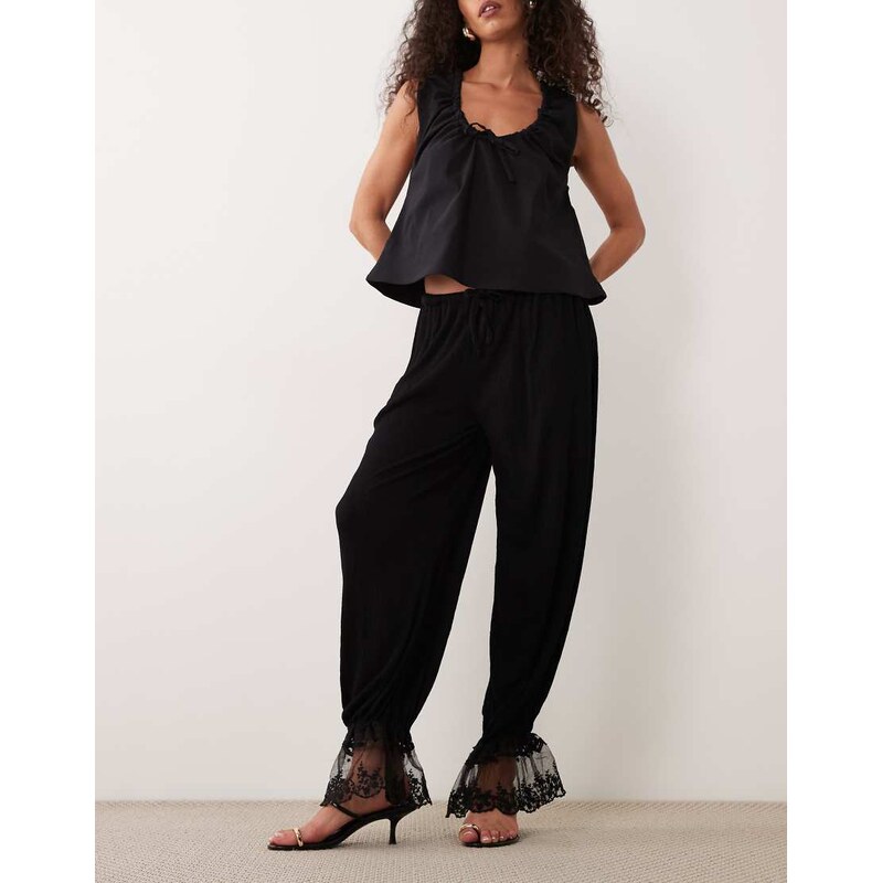 ASOS DESIGN co-ord crinkle balloon trouser with hem detail in black 115711596