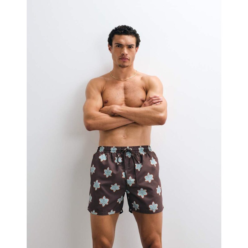 South Beach flower motif swim short in dark brown