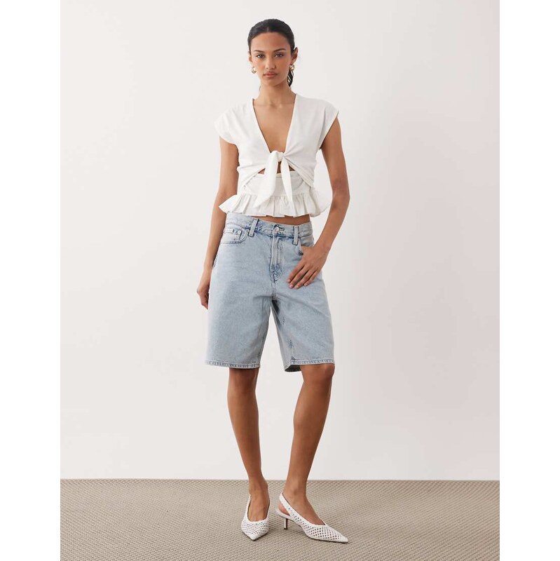 ASOS DESIGN tie front cutout top with peplum hem in white