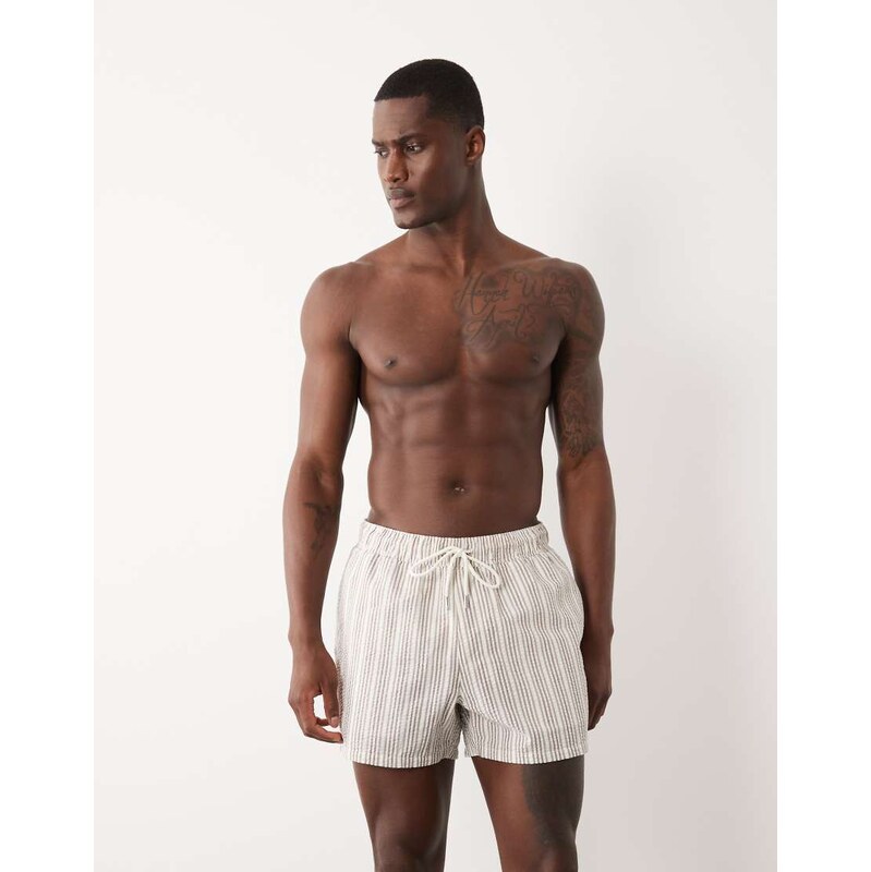 ASOS DESIGN seersucker stripe swim shorts in short length in