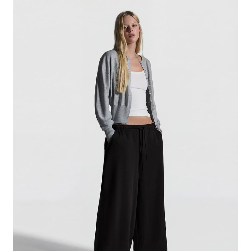 Bershka Petite barrel plush trousers with stoppers in black 115730768