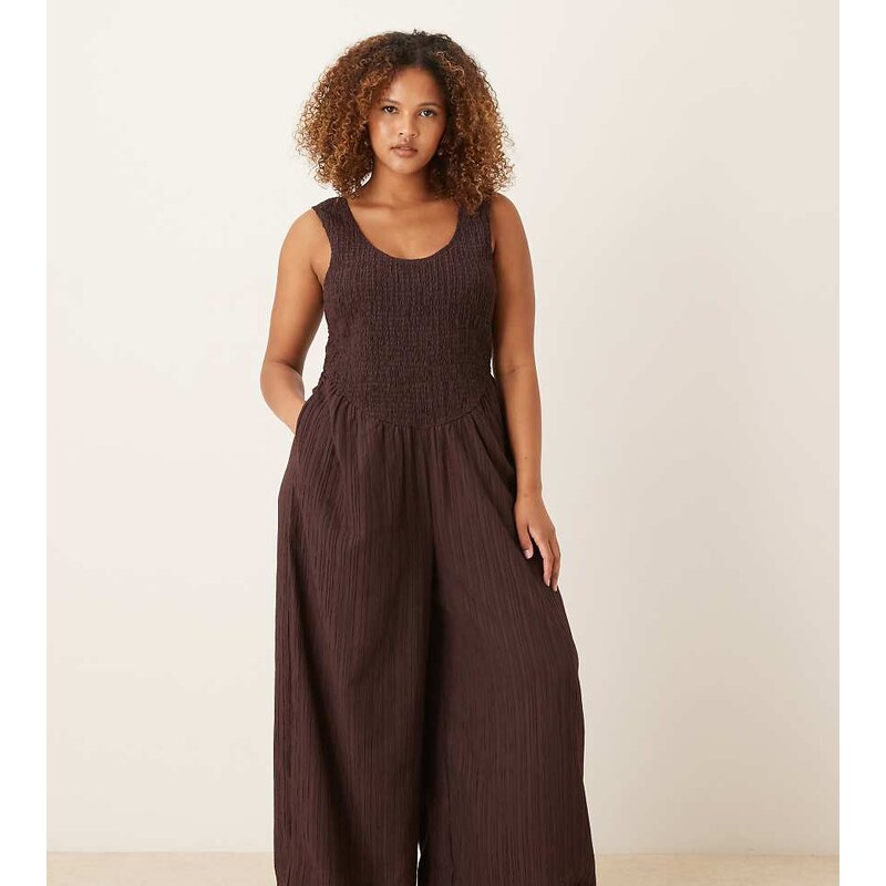 ASOS Curve ASOS DESIGN Curve scoop neck crinkle jumpsuit in brown 115733509
