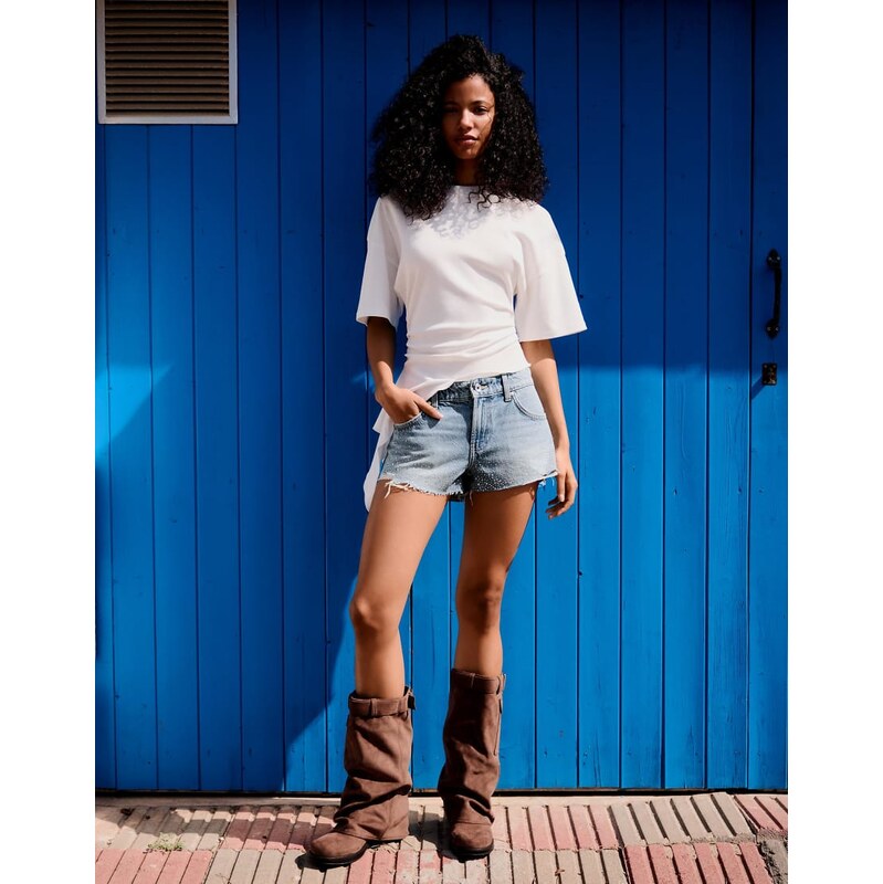 Bershka Shimmery denim shorts in mid blue 115740959