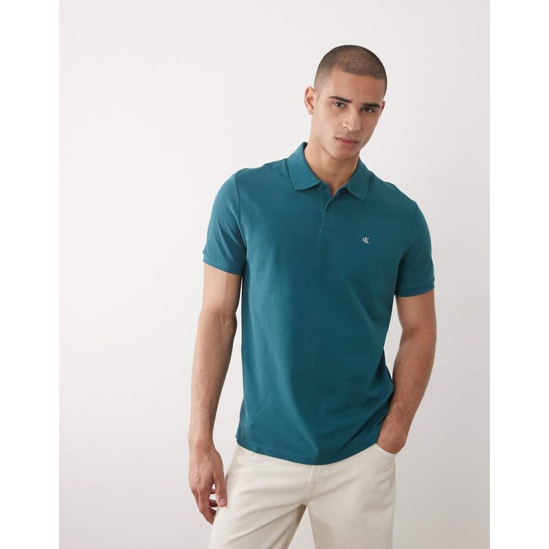 Calvin Klein Jeans monogram pique polo shirt in teal-Blue 115746320