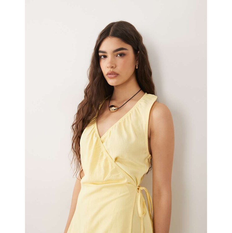 ASOS DESIGN linen blend halter wrap mini dress in buttermilk-Yellow 115746373