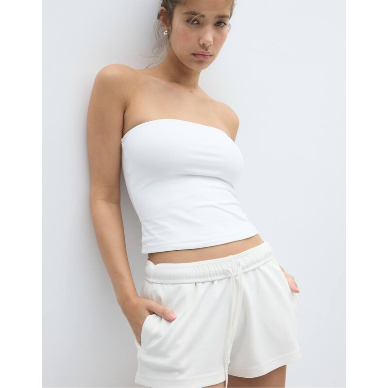 Stradivarius Micro shorts with turn-up waist in ecru-White