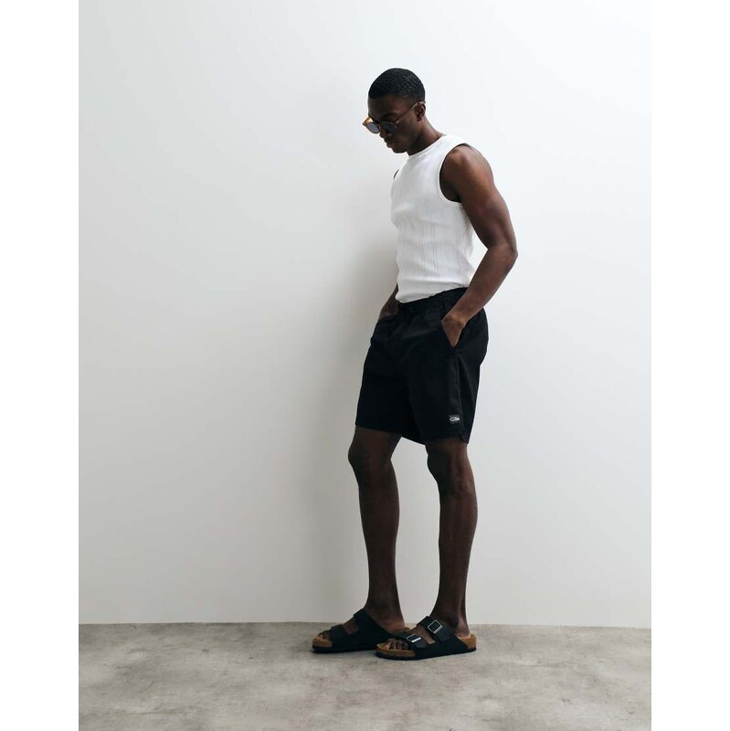 Hollister super baggy destroyed denim short in mid blue wash