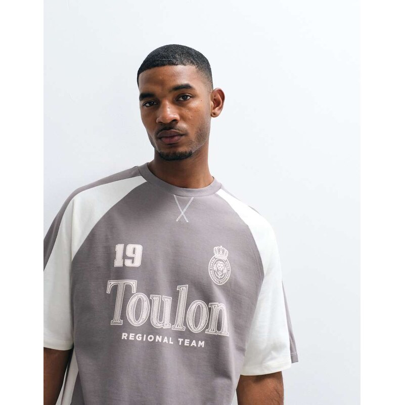 ASOS DESIGN oversized cut and sew t-shirt with football graphic