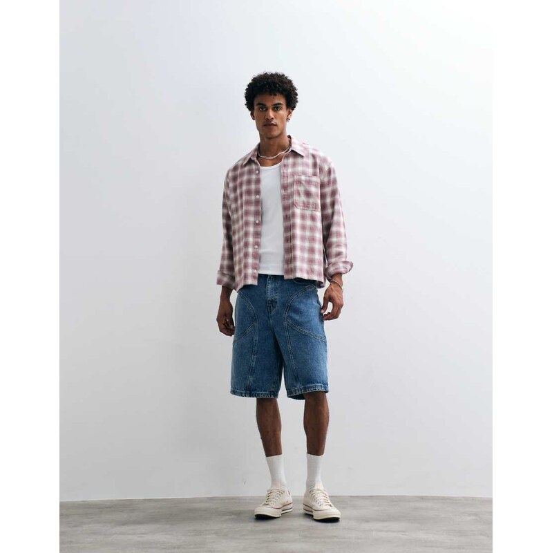 Courtside panel detail denim jorts in mid wash blue