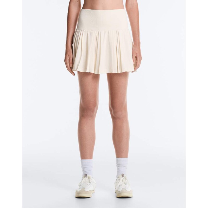 OYSHO Pleated high-rise seamless short skirt in pale ecru