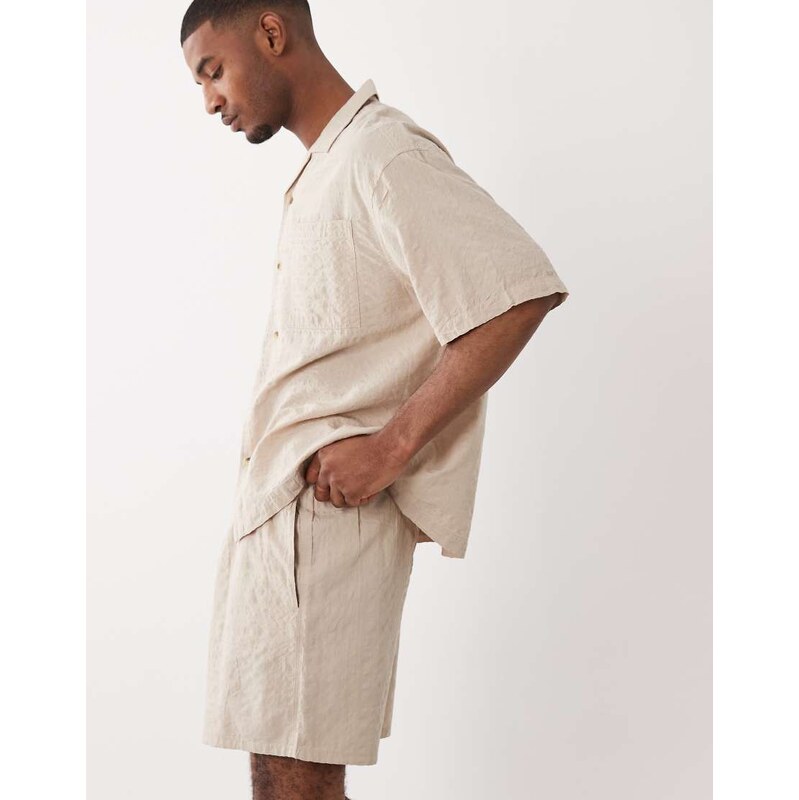 ASOS DESIGN co-ord seersucker shorts in mid length in beige