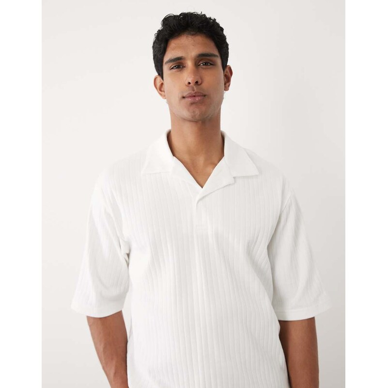 ASOS DESIGN heavyweight relaxed polo with half sleeve in white