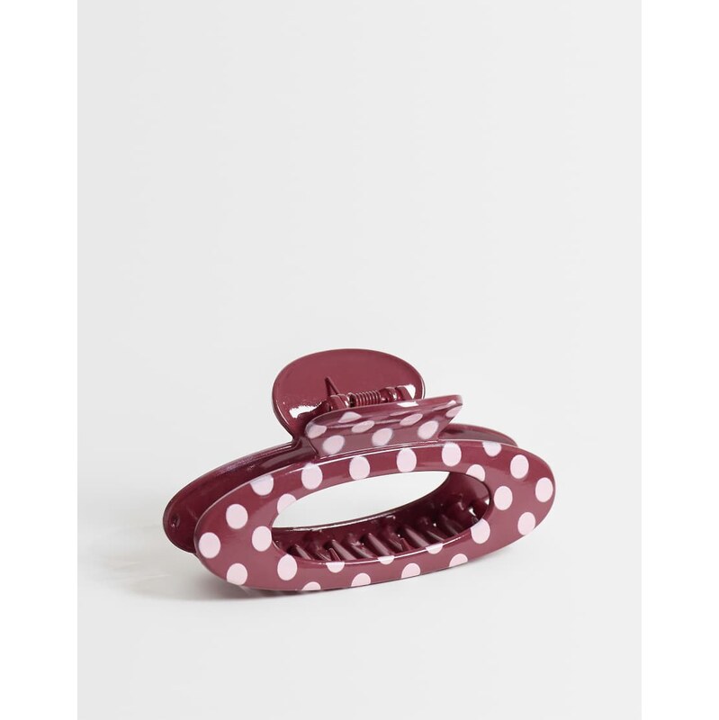 ASOS DESIGN large oval polka dott hair claw in pink and burgundy