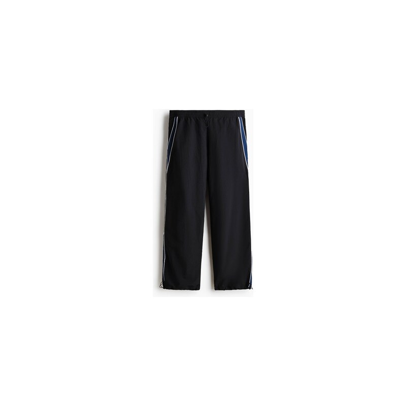 H&M - Nylonové sportovní kalhoty Loose Fit - Černá/Díly