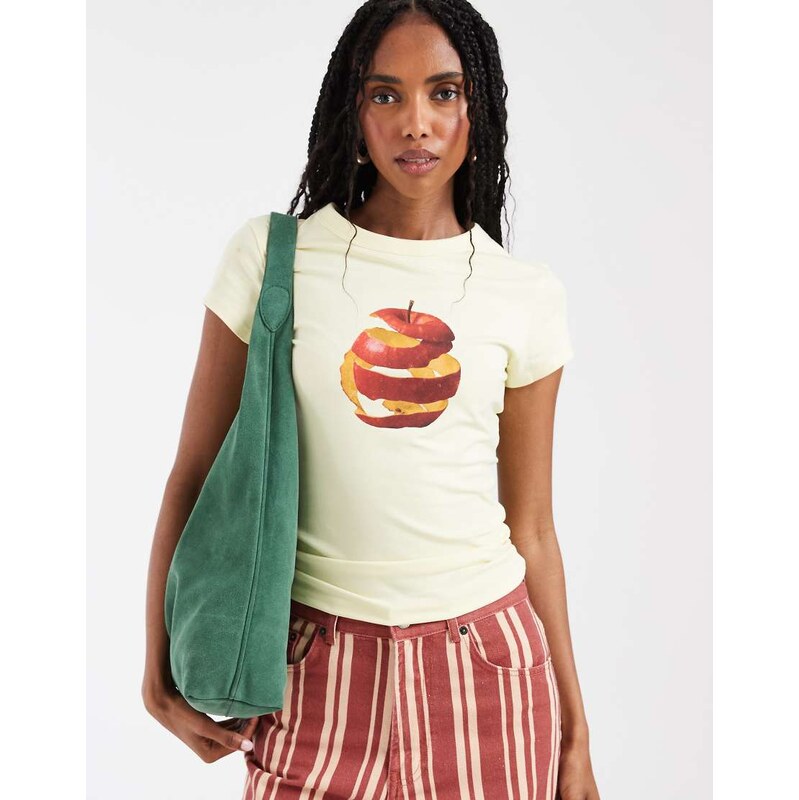 ASOS DESIGN Baby tee with spiral apple graphic in pale yellow