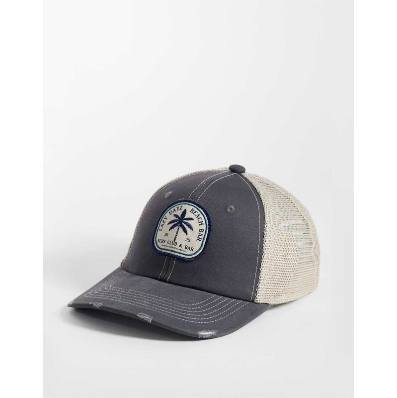 ASOS DESIGN washed trucker cap in blue