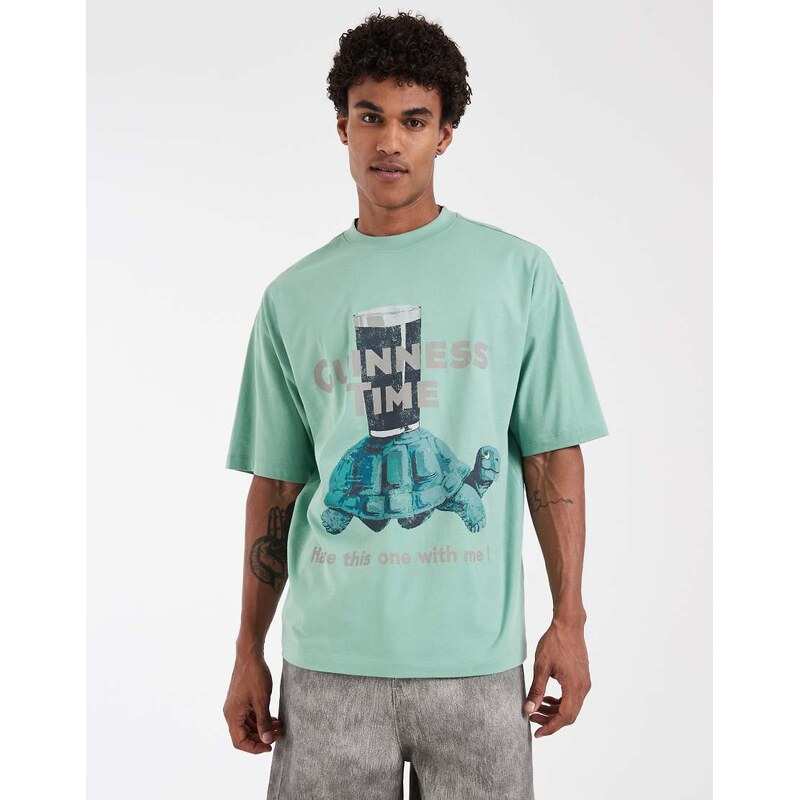 ASOS DESIGN oversized tee with Guinness print in Green