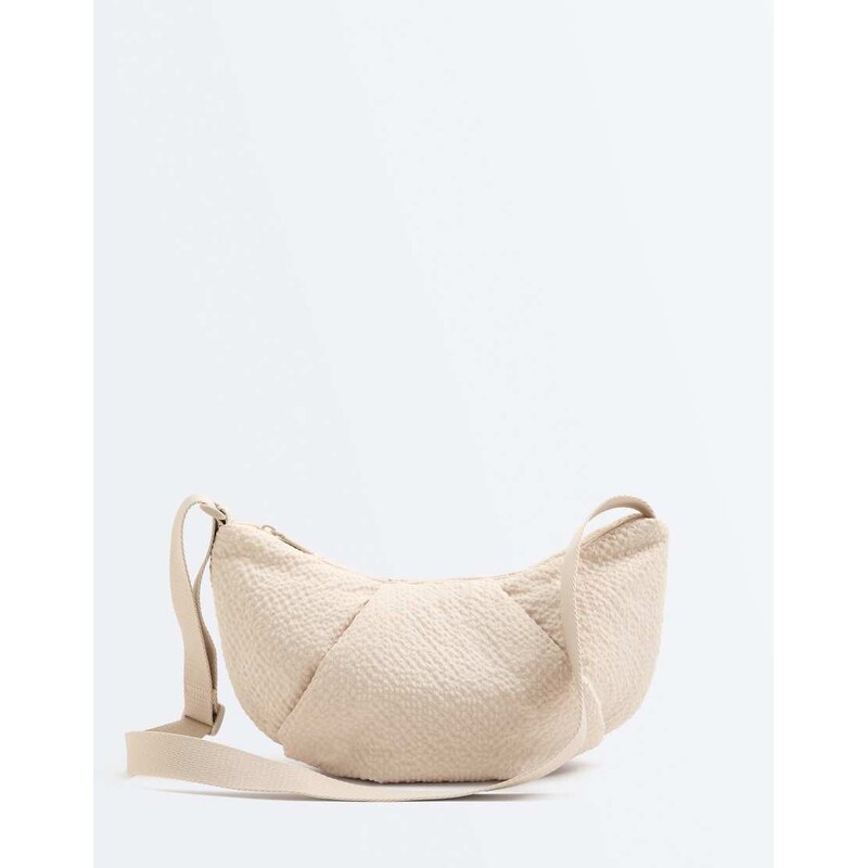 OYSHO Textured quilted crossbody bag in ecru-Neutral