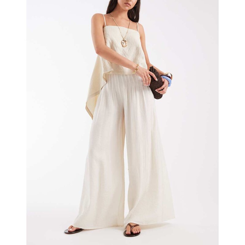 ASOS DESIGN Tailored palazzo sheer pleated trouser in cream