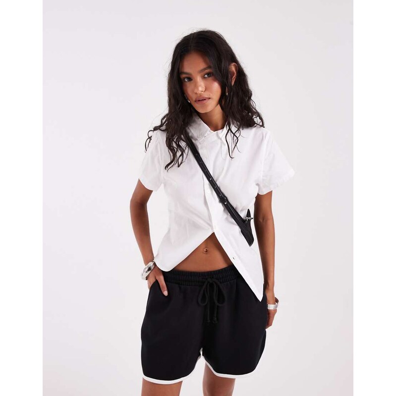 ASOS Design runner short in black with white piping