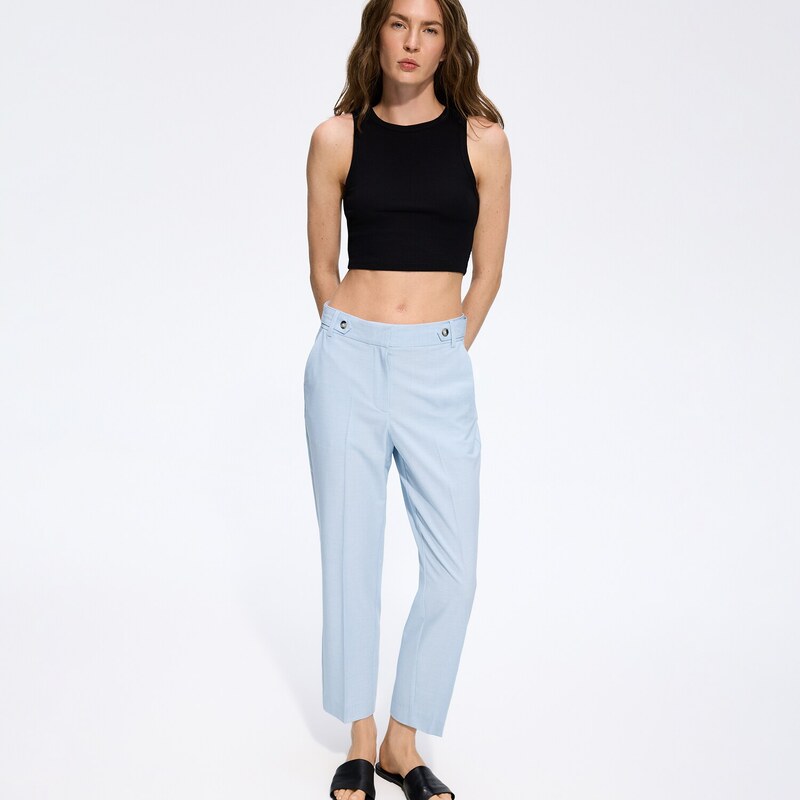 Reserved - Kalhoty s nažehlenými puky - bleděmodrá
