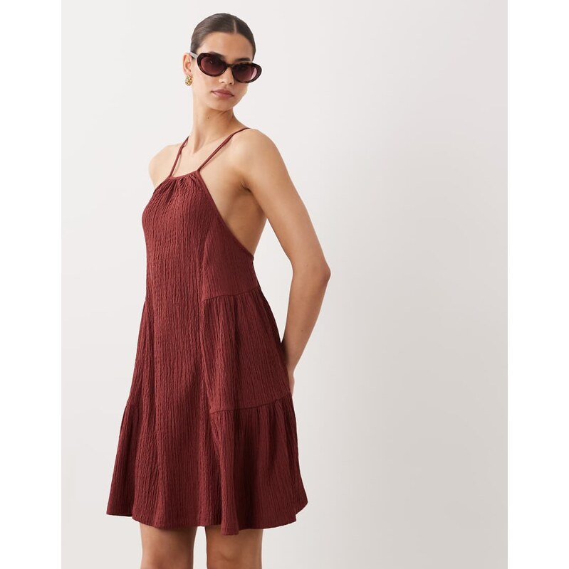 ASOS DESIGN textured halter trapeze mini dress in rust-Brown
